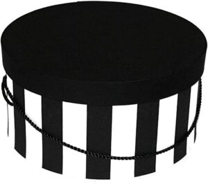 239-A wide black and white stripe fabric base with a black fabric lid.  Black cording completes the traditional hatbox.
