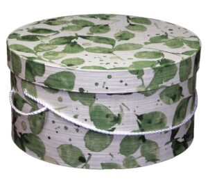 240  White fabric hatbox with a green leaf design and a white cording handle.
