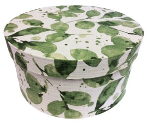 White linen background with green leaves #43